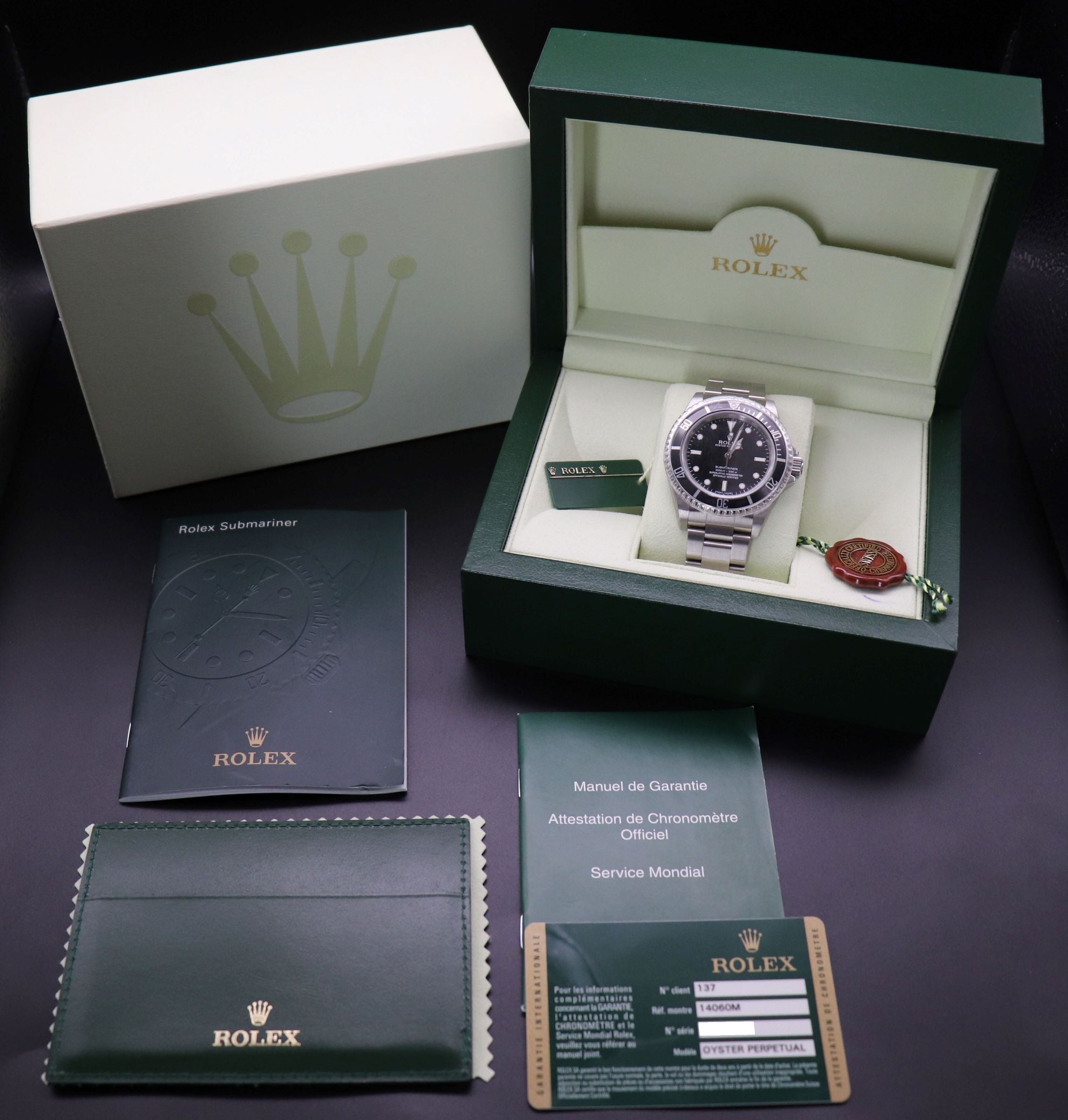 Rolex Submariner 14060M NOS Four-Liner 2009 Fullset