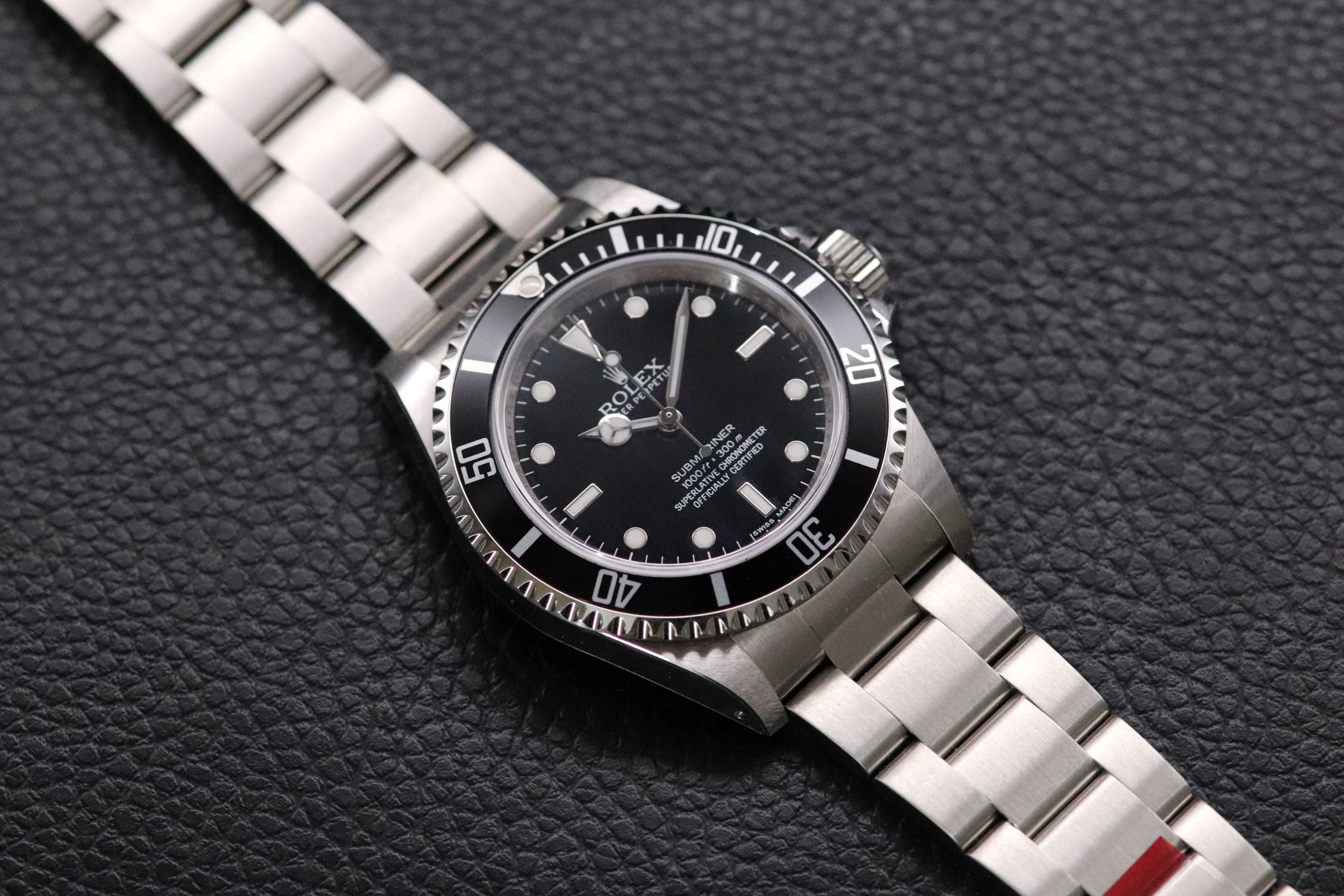 Rolex Submariner 14060M NOS Four-Liner 2009 Fullset