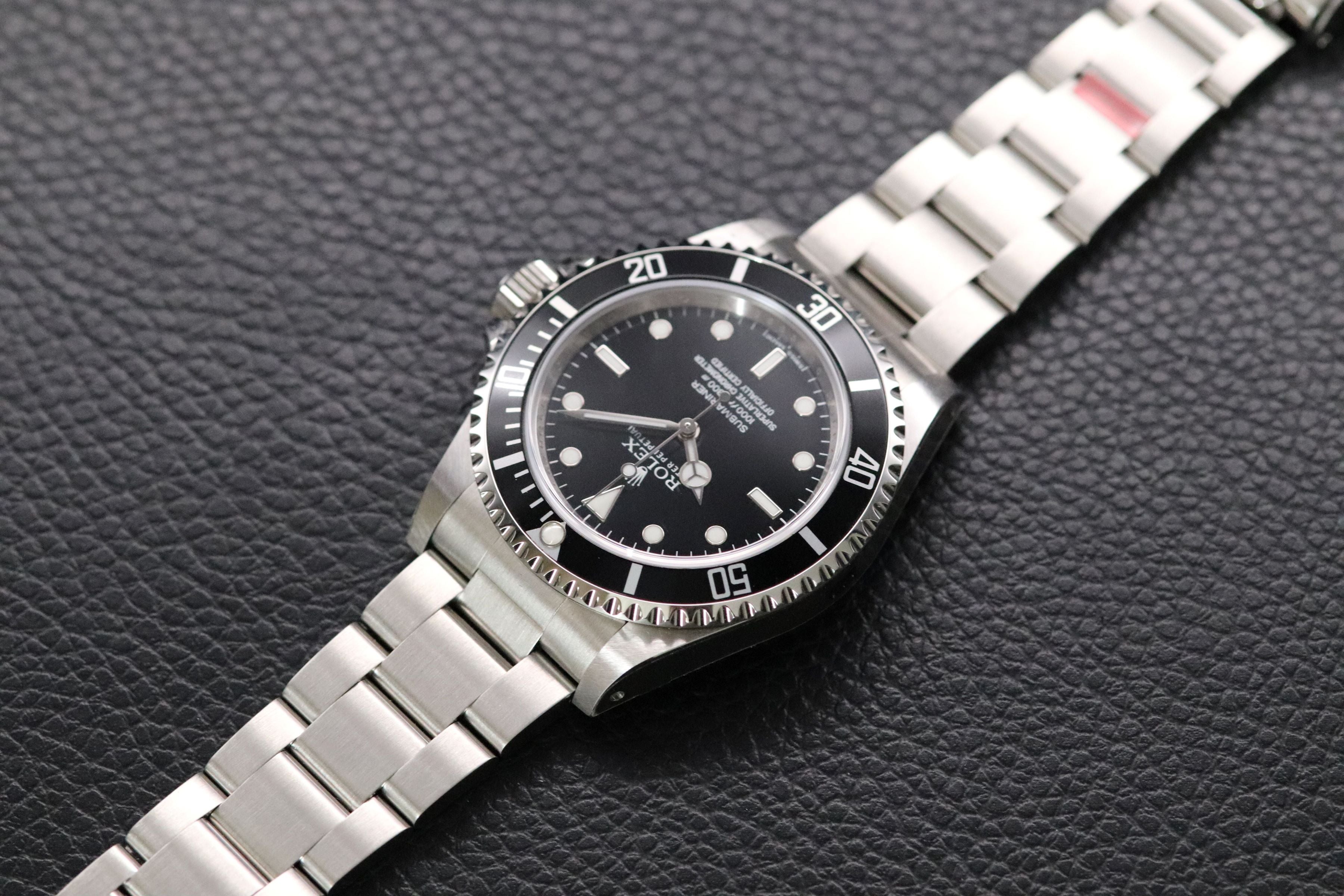 Rolex Submariner 14060M NOS Four-Liner 2009 Fullset